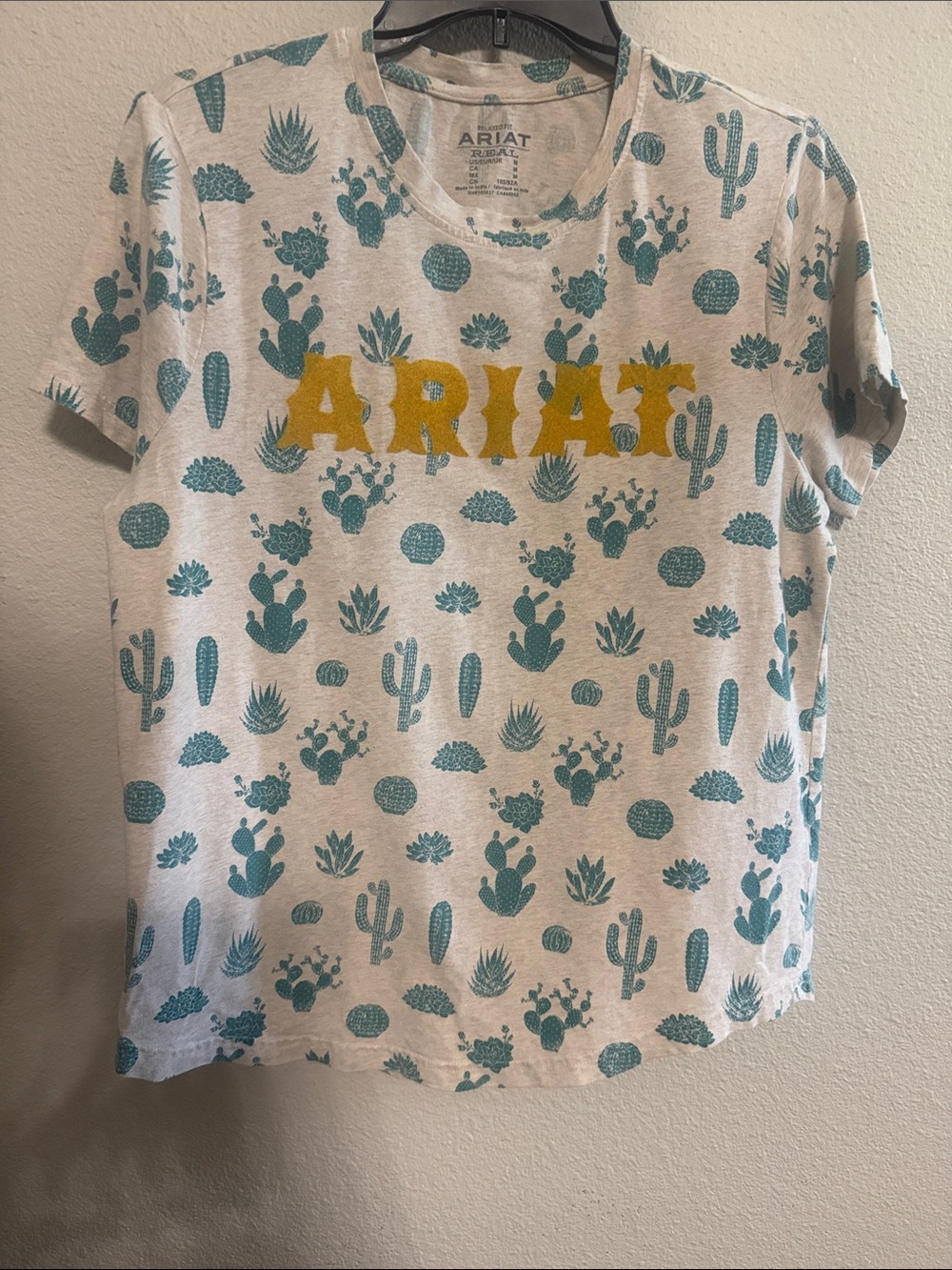 Ariat Kids Cream Tee with Teal Cactus Print and Yellow Logo